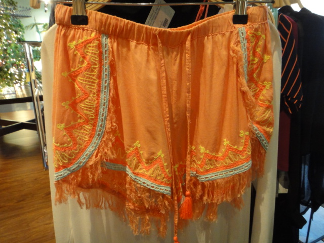 Clothing Rack Filled With New Women's Designer Cloths Size "S"