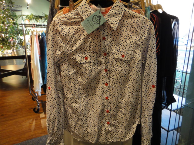 Clothing Rack Filled With New Women's Designer Cloths Size "S"