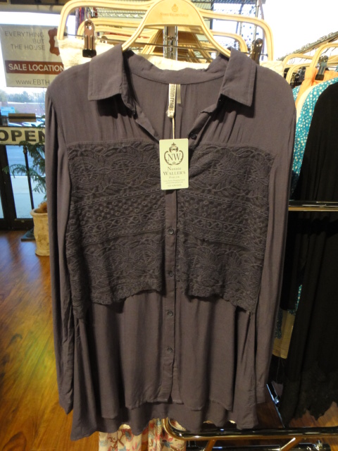 Clothing Rack Filled With New Women's Designer Cloths Size "M"