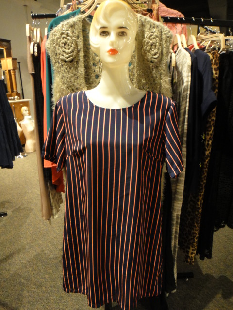 Clothing Rack Filled With New Women's Designer Cloths Size "M"