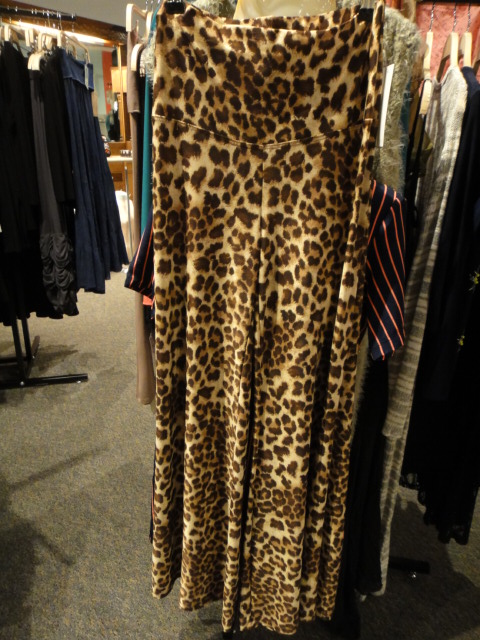 Clothing Rack Filled With New Women's Designer Cloths Size "M"