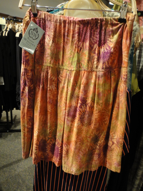 Clothing Rack Filled With New Women's Designer Cloths Size "M"