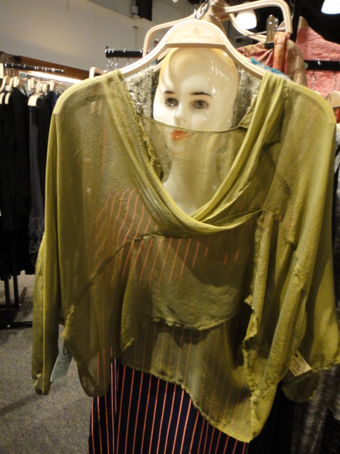 Clothing Rack Filled With New Women's Designer Cloths Size "M"