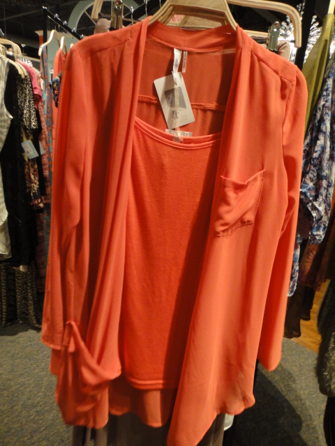 Clothing Rack Filled With New Women's Designer Cloths Size "M"