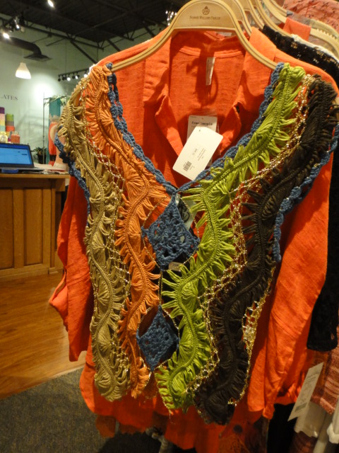 Clothing Rack Filled With New Women's Designer Cloths Size "M"