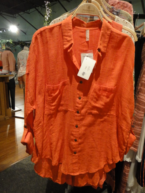 Clothing Rack Filled With New Women's Designer Cloths Size "M"