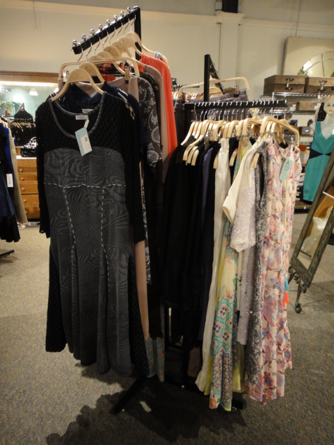 Clothing Rack Filled With New Women's Designer Clothes Size "M"