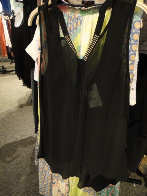 Clothing Rack Filled With New Women's Designer Clothes Size "M"