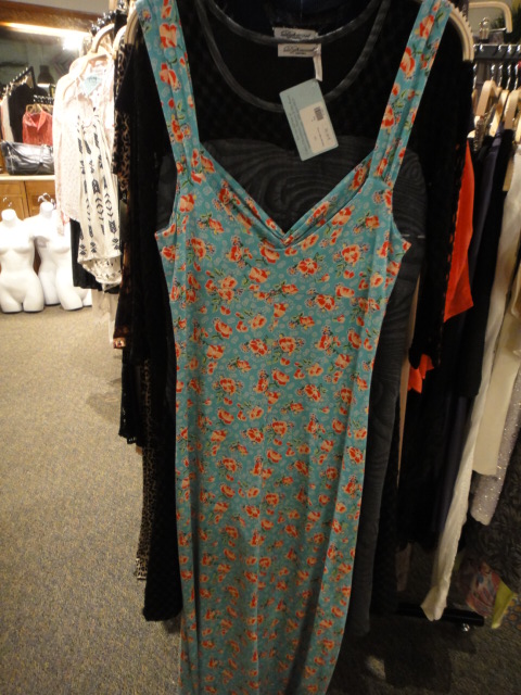 Clothing Rack Filled With New Women's Designer Clothes Size "M"