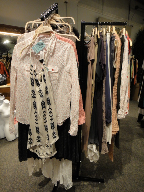 Clothing Rack Filled With New Women's Designer Clothes Size "L"