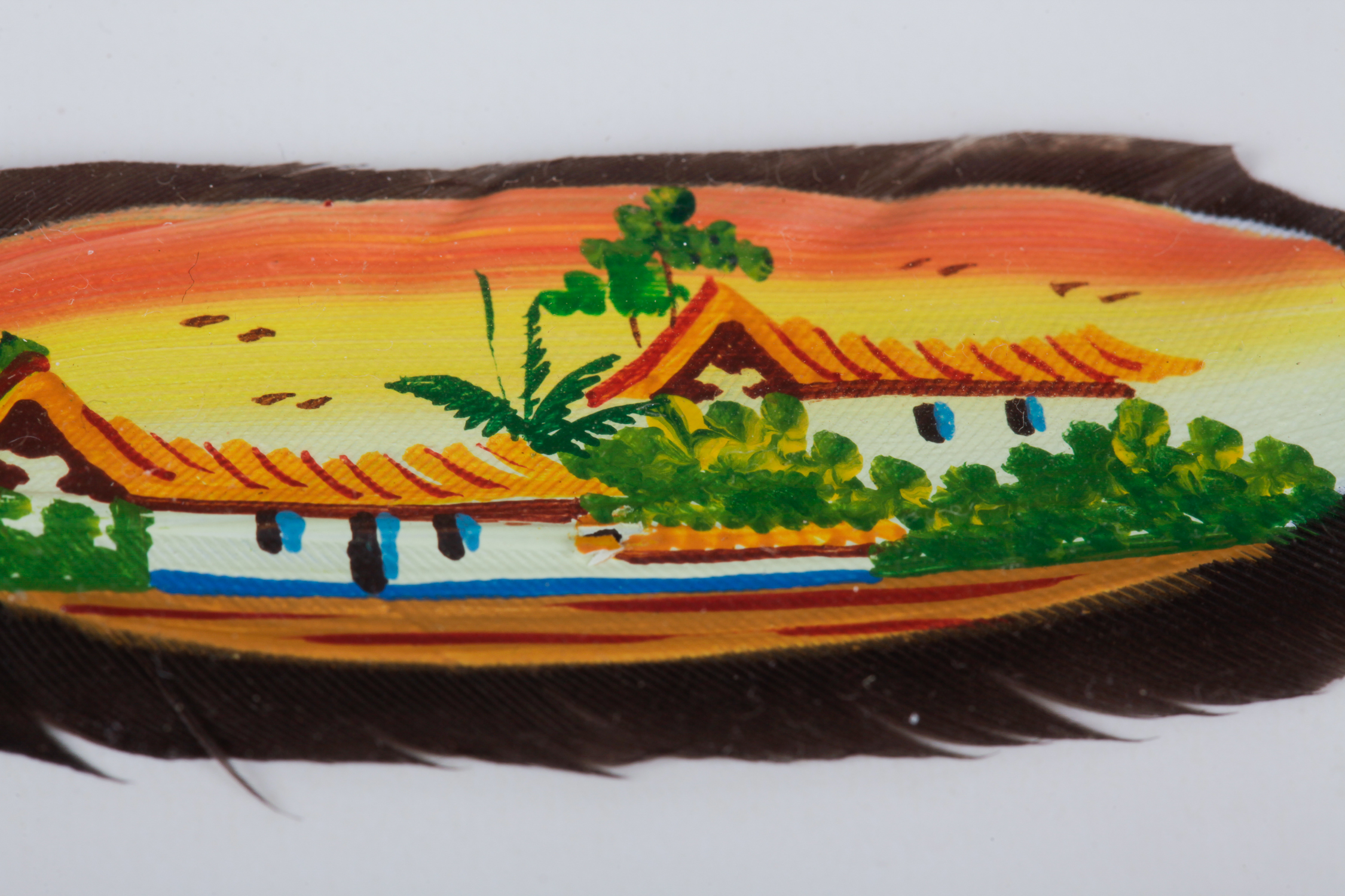 Pair of Framed Jose Garro Painted Feathers features paintings