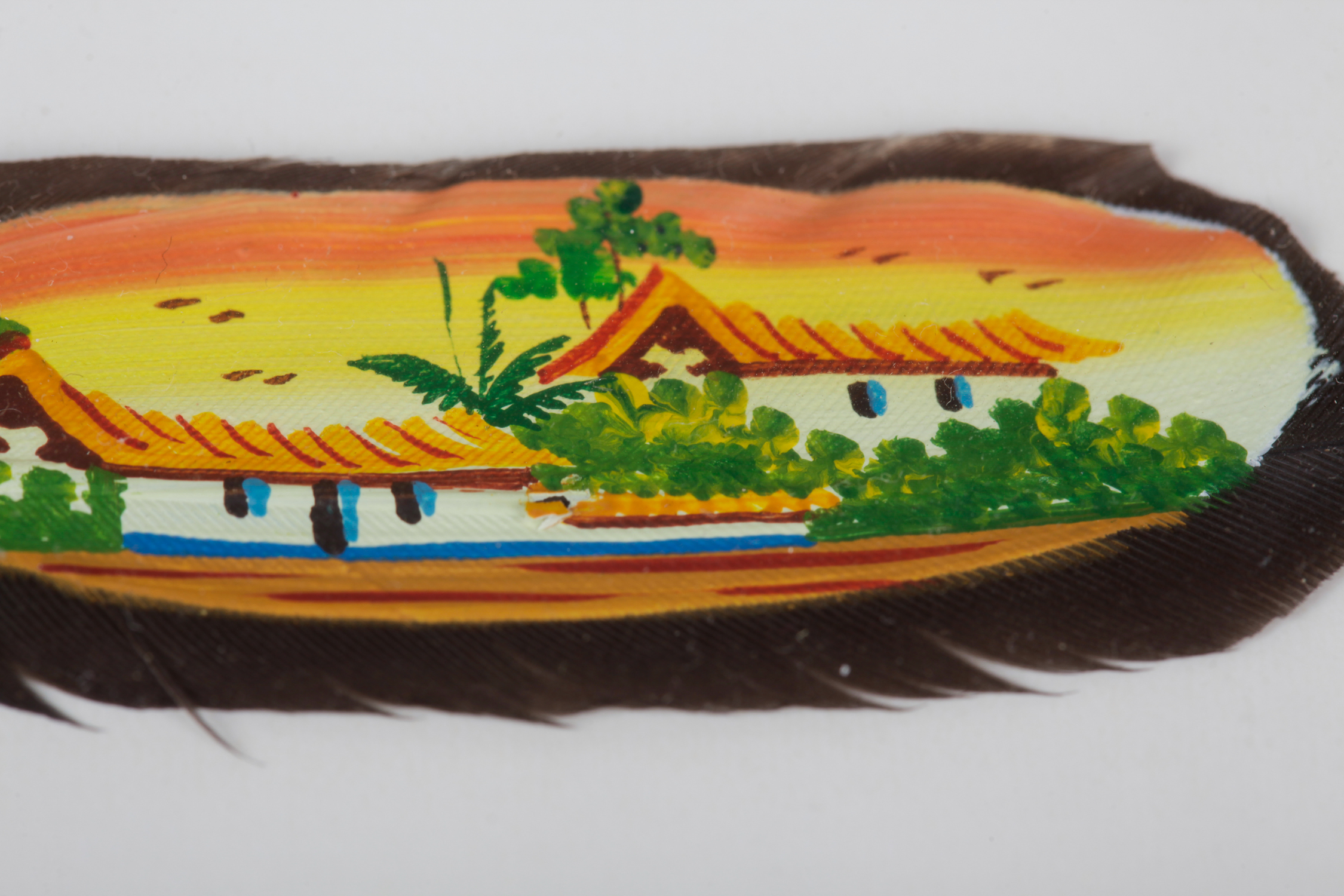 Pair of Framed Jose Garro Painted Feathers features paintings