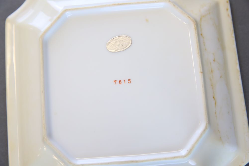 Blue and White Coffee Pot, Serving Dish, and Decorative Plates