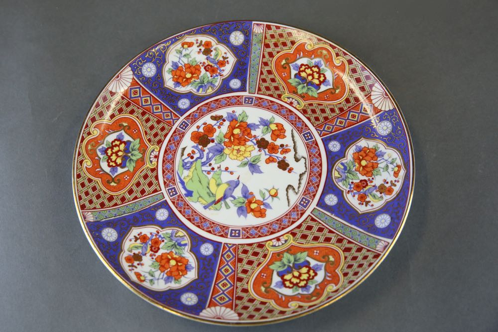 Blue and White Coffee Pot, Serving Dish, and Decorative Plates