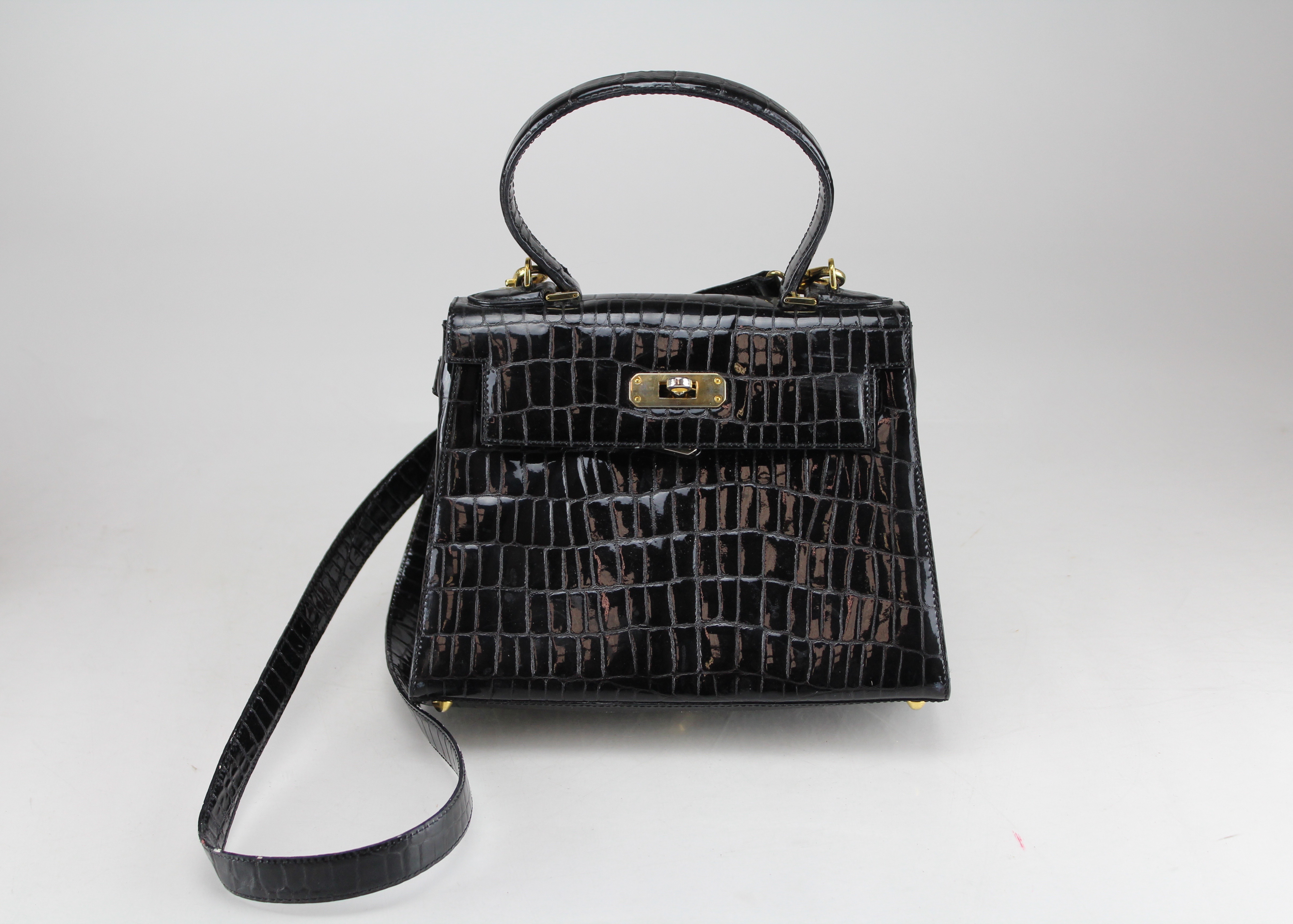 Etienne Aigner, Bruno Magli, and Antonio Melani Purses