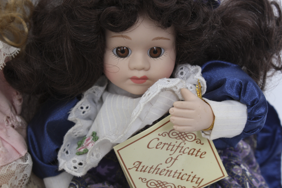 Porcelain Dolls with Curly Hair and Jean Vests
