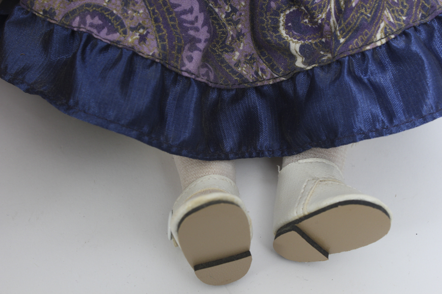 Porcelain Dolls with Curly Hair and Jean Vests