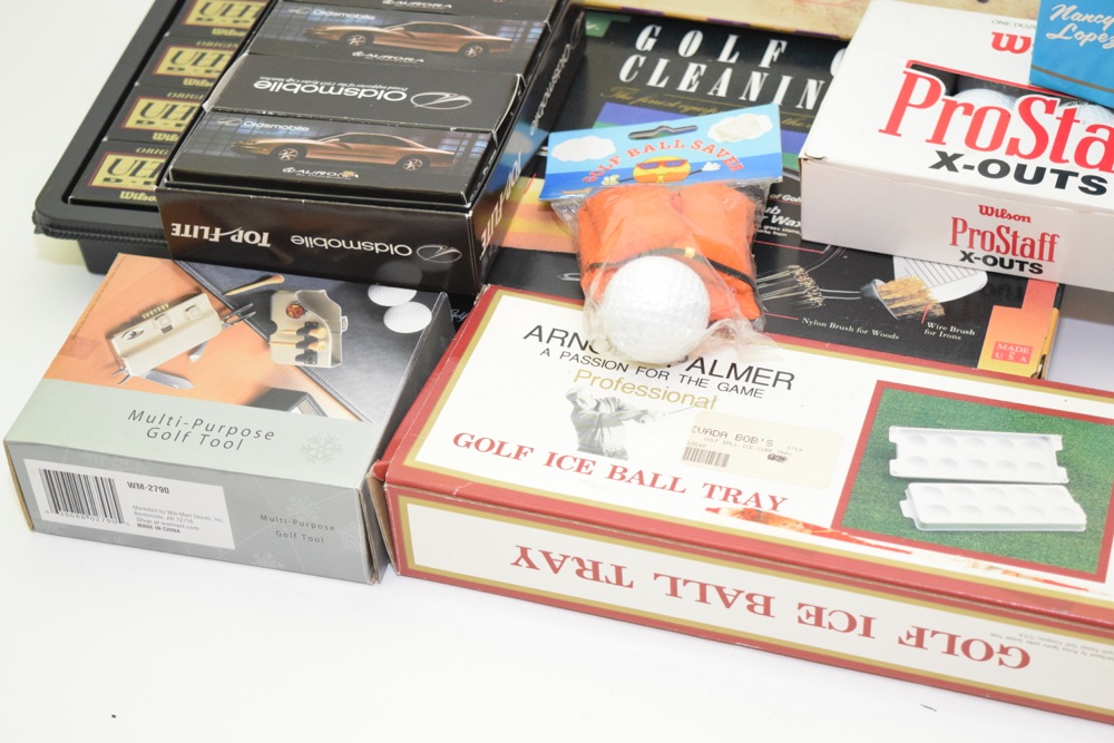 Collection of Golf Balls and Accessories