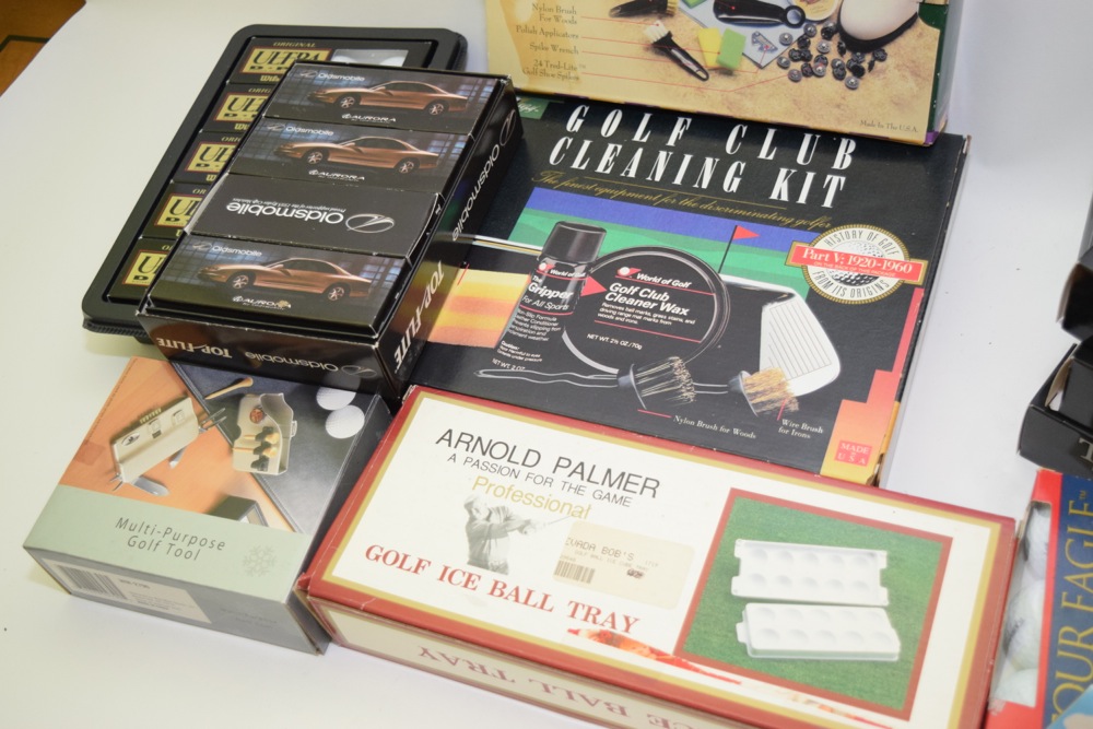 Collection of Golf Balls and Accessories