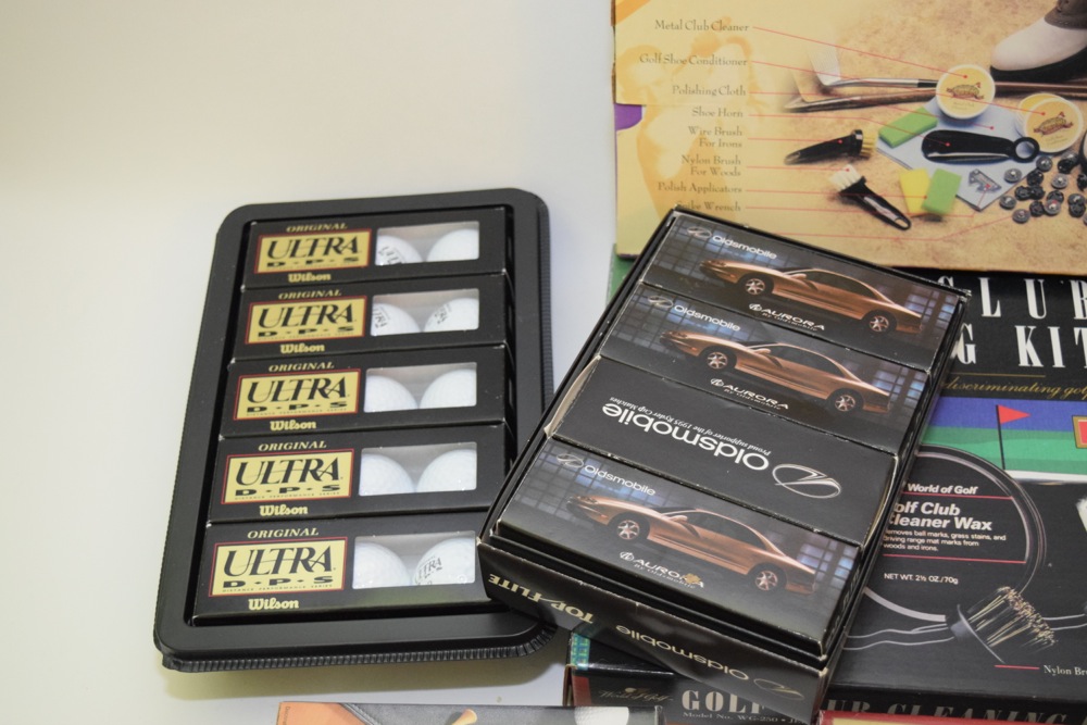 Collection of Golf Balls and Accessories