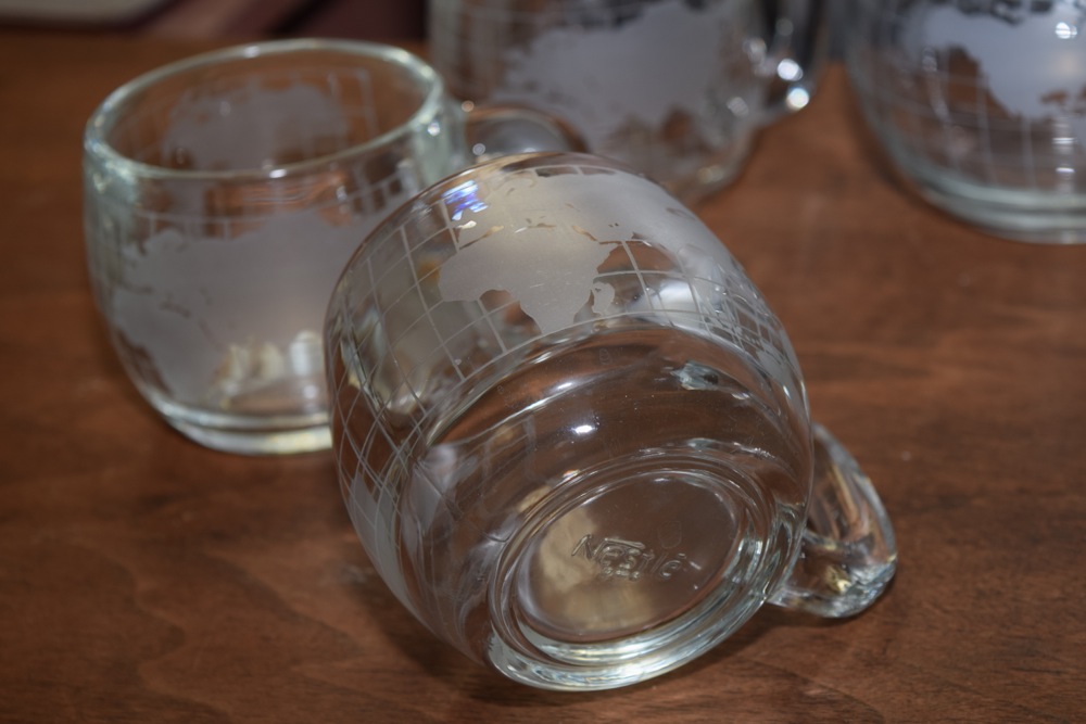 Collection of Etched Globe Mugs and Bowl