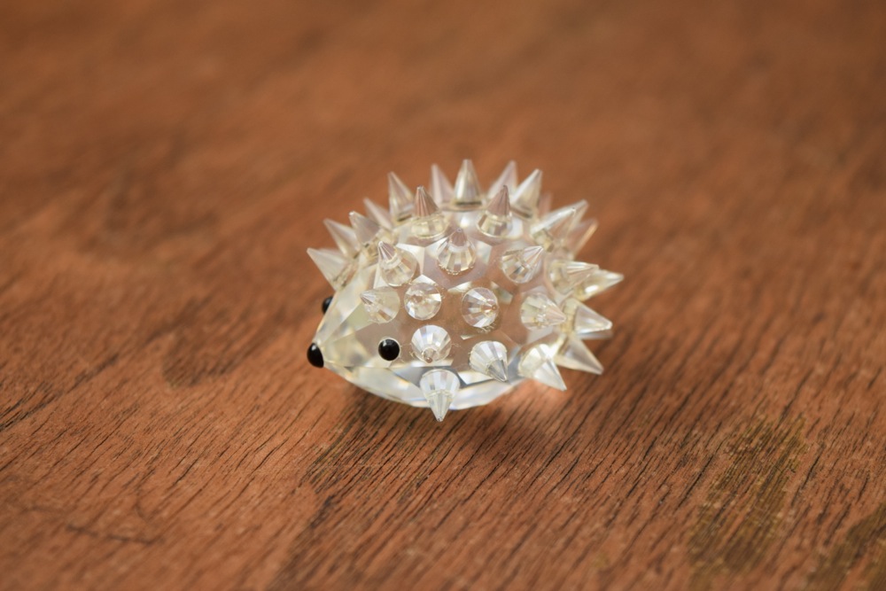 Pair of Swarovski Figurines, Including Alligator and Porcupine