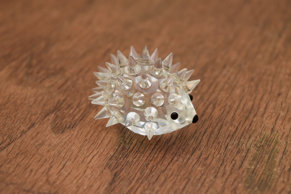 Pair of Swarovski Figurines, Including Alligator and Porcupine