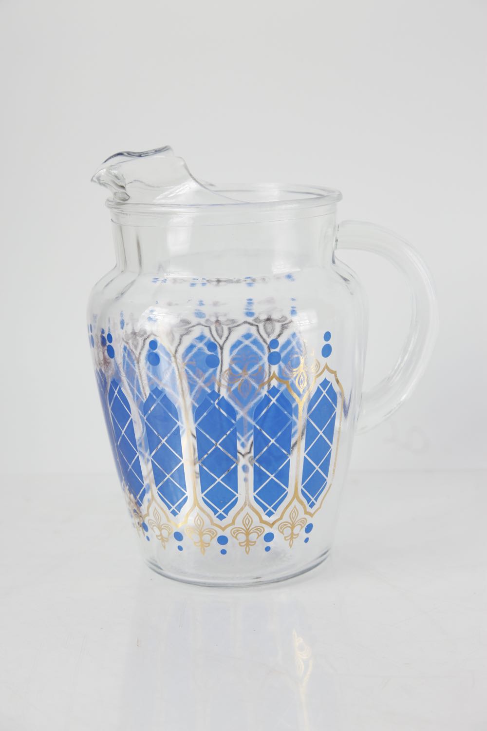 Blue and Gold Pitcher and Glasses