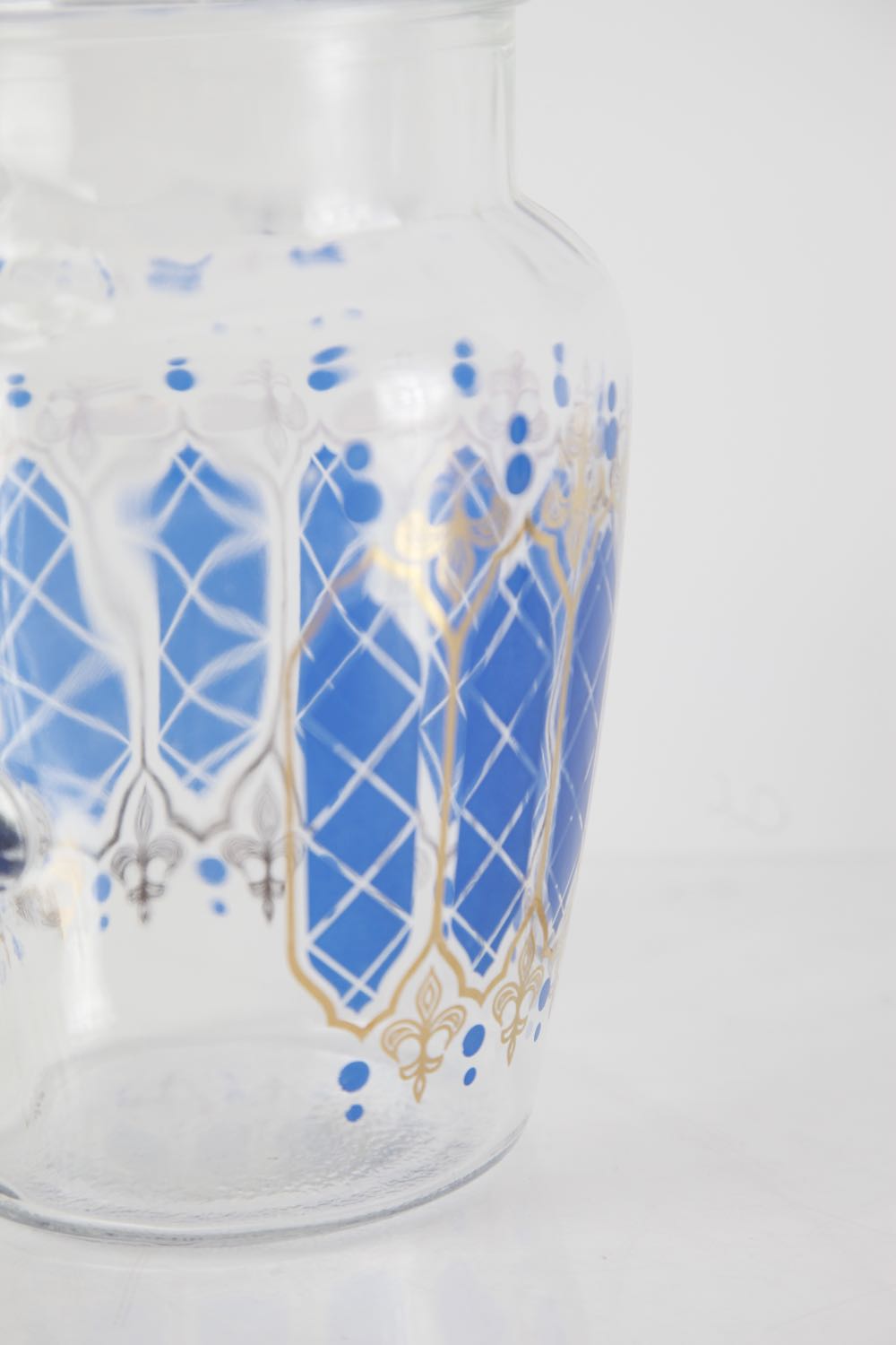 Blue and Gold Pitcher and Glasses