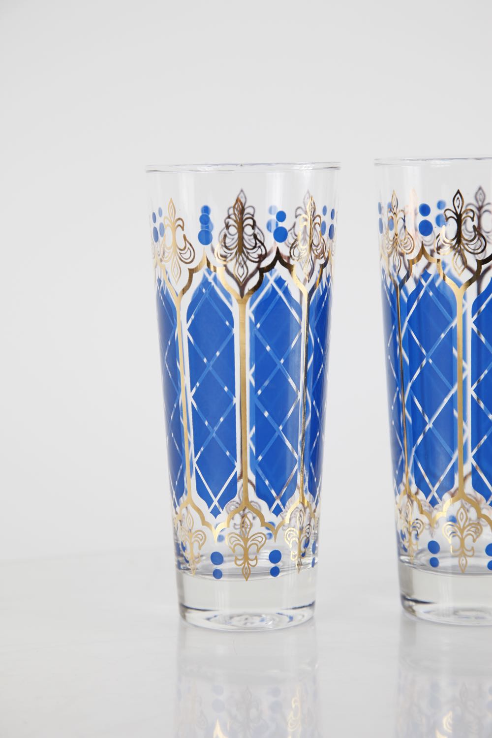 Blue and Gold Pitcher and Glasses