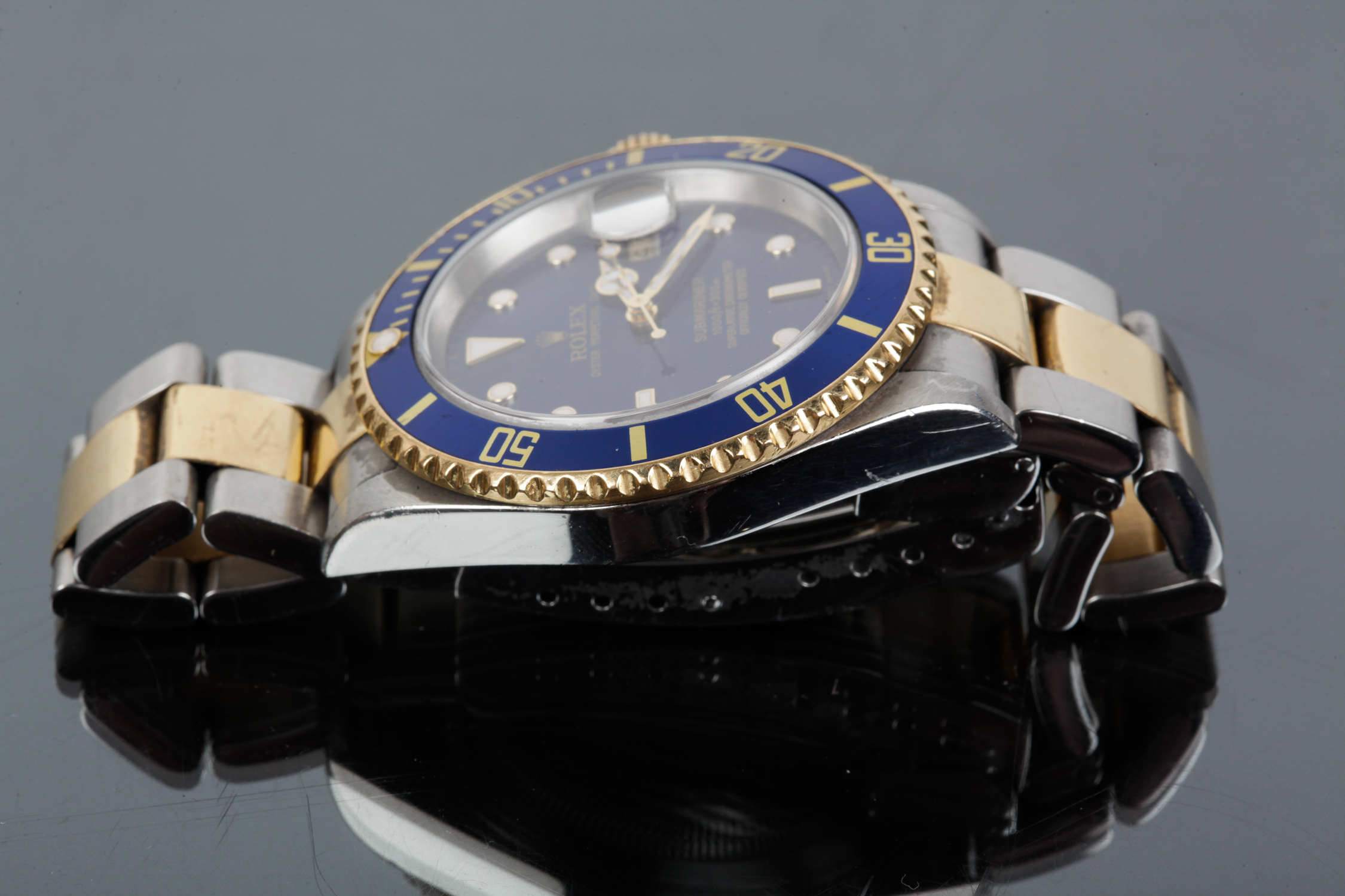 18K Yellow Gold and Stainless Submariner Date Rolex Watch