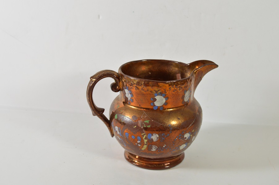 Two Copper Luster Pitchers