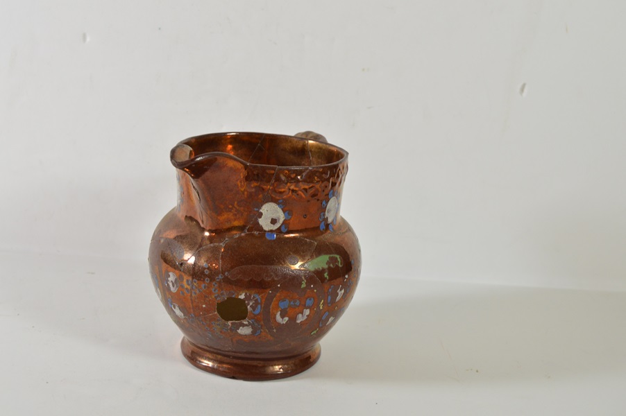 Two Copper Luster Pitchers