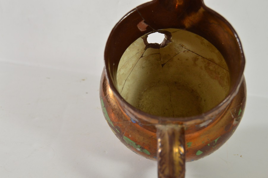 Two Copper Luster Pitchers