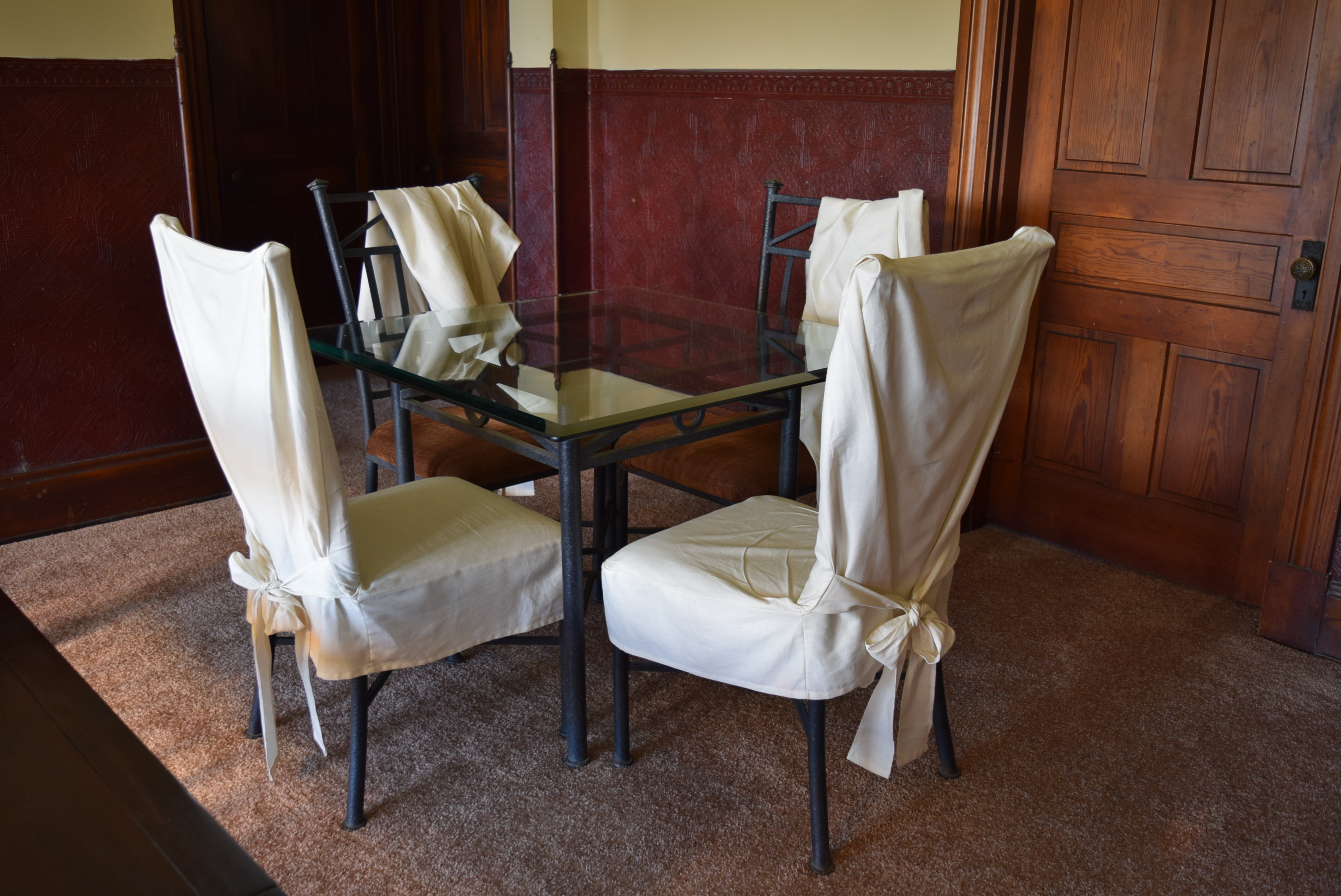 Glasstop Iron Table with Four Chairs