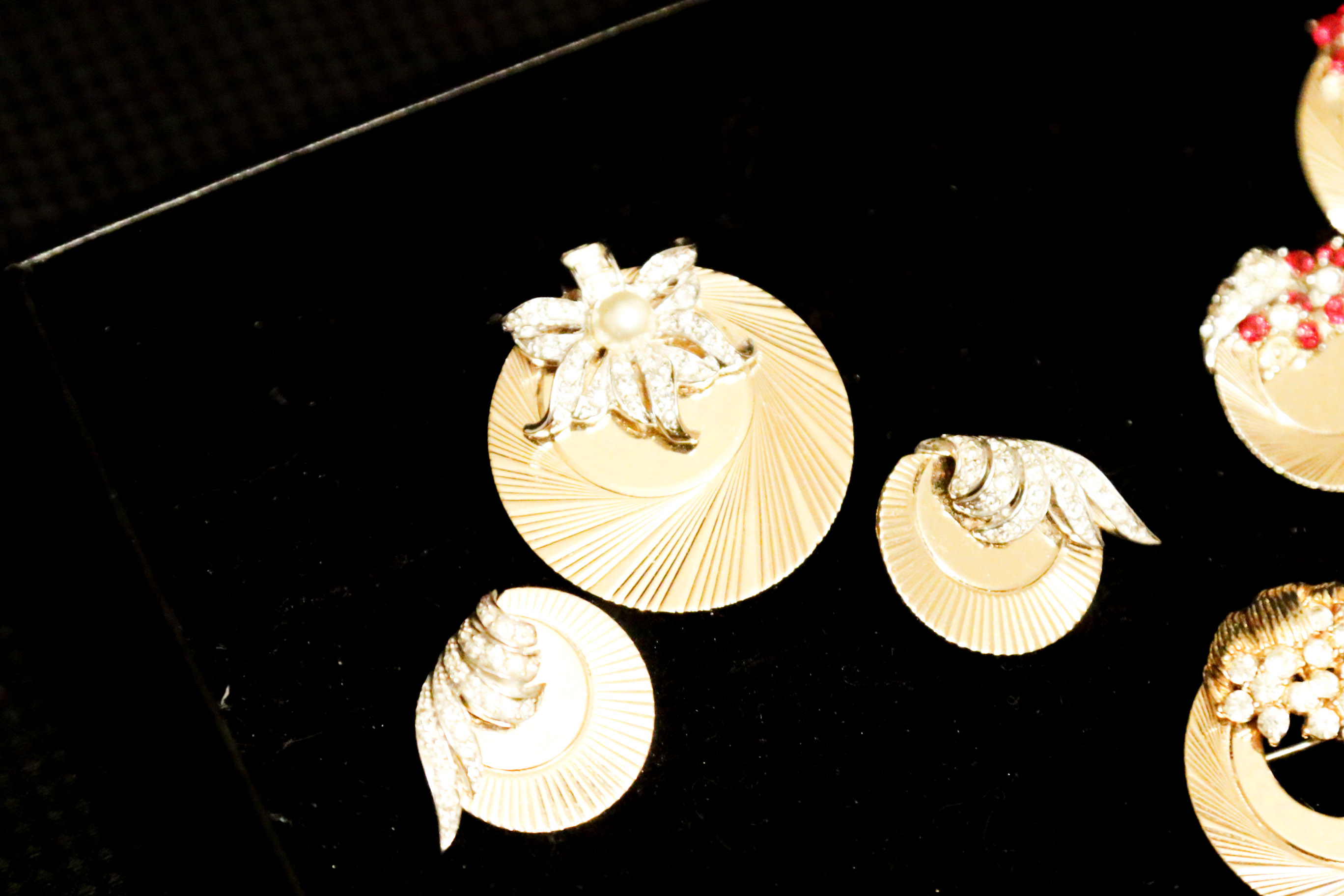 Two Sets of Boucher Brooches and Earrings