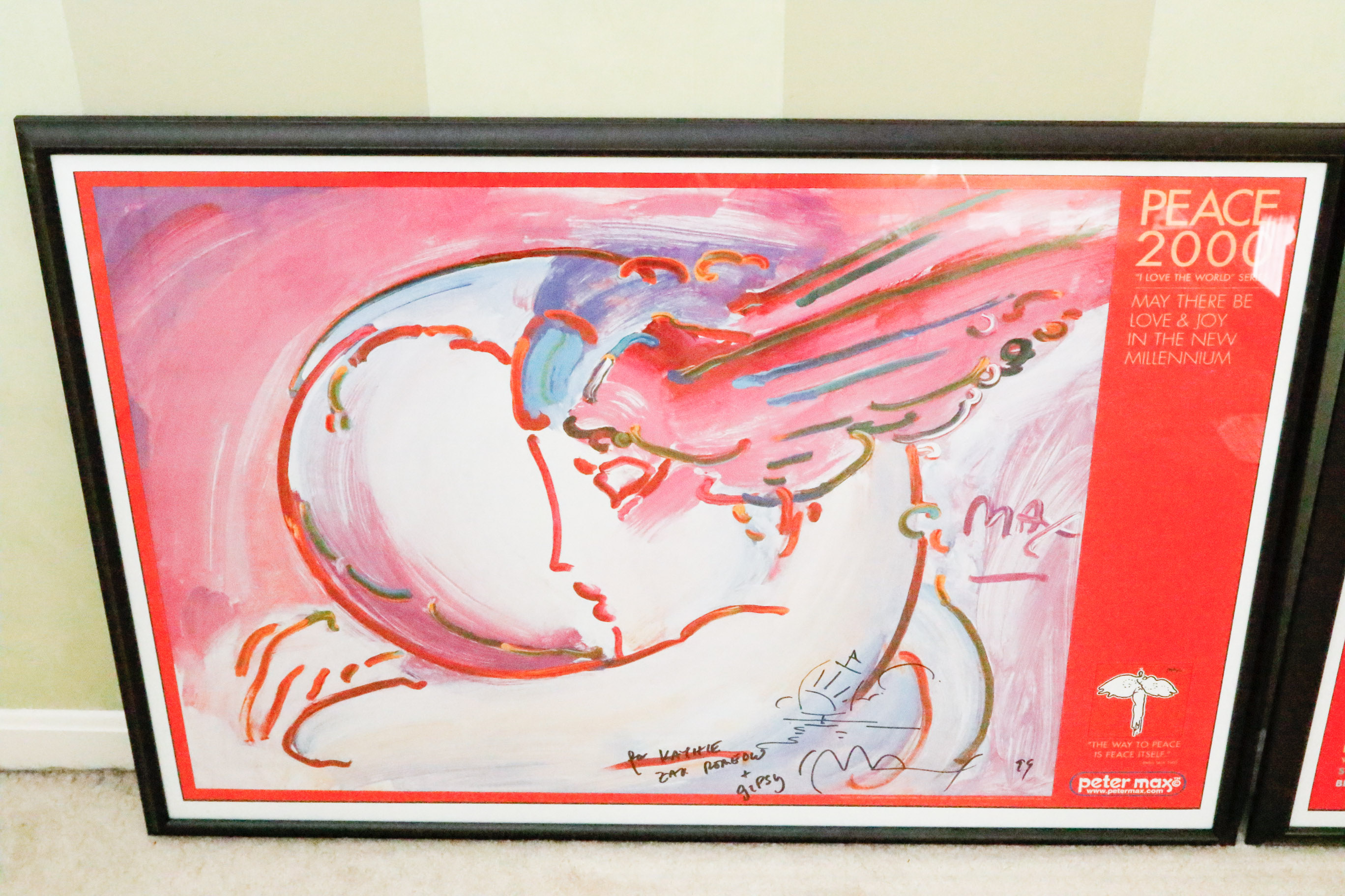 Pair of Framed Posters Signed by Artist Peter Max