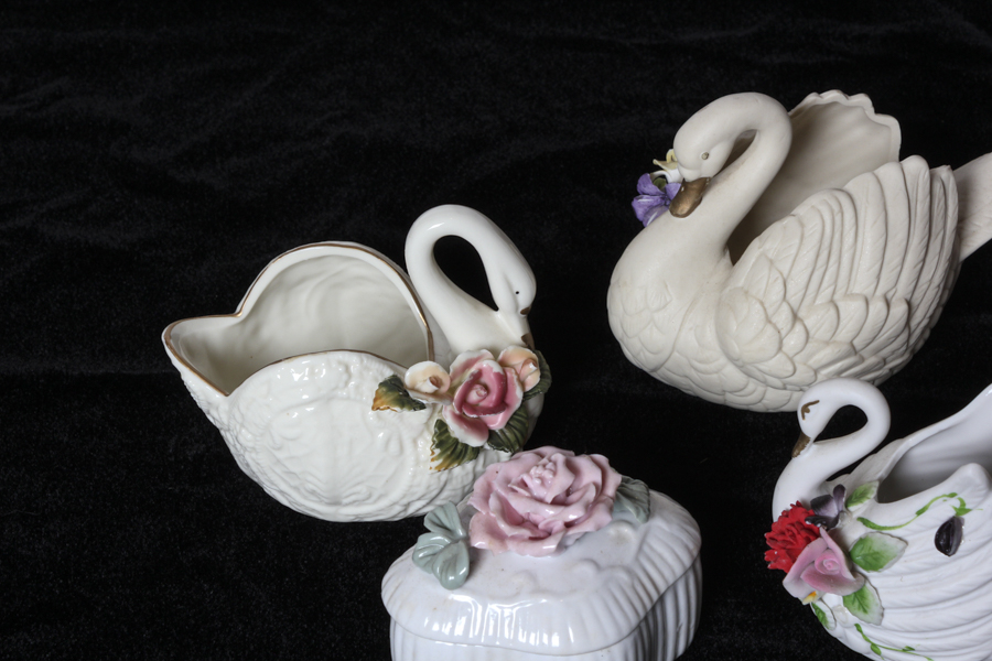 Grouping of Bisque and Porcelain Swans
