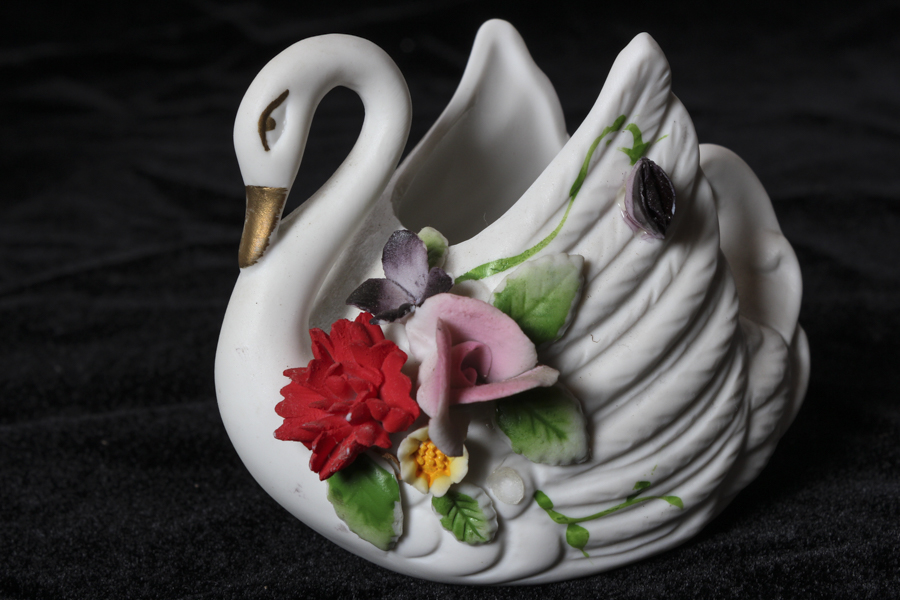 Grouping of Bisque and Porcelain Swans