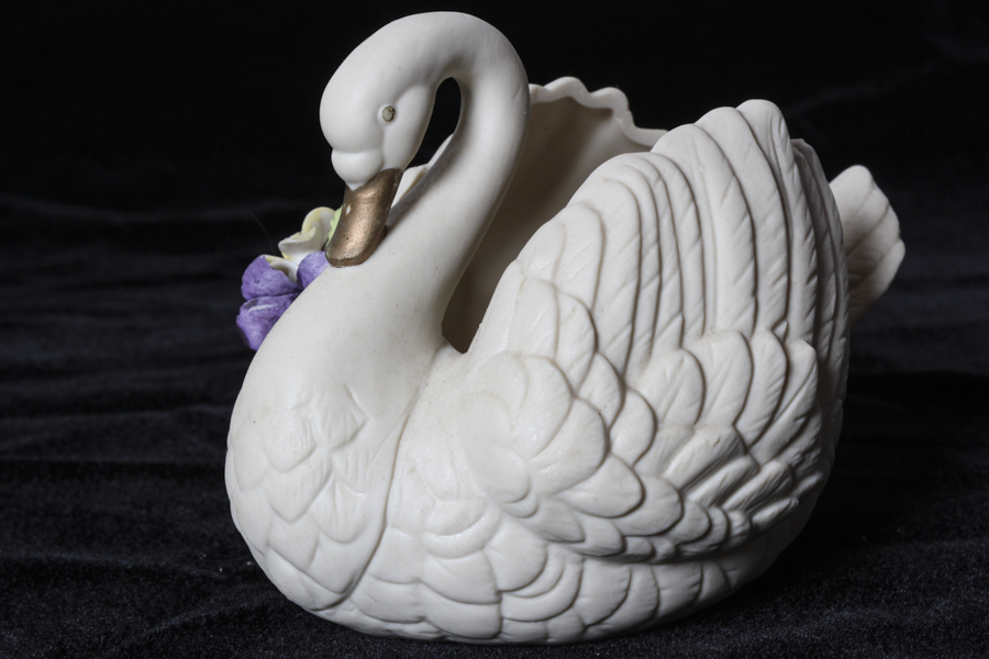 Grouping of Bisque and Porcelain Swans