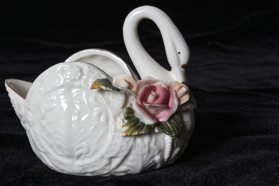 Grouping of Bisque and Porcelain Swans
