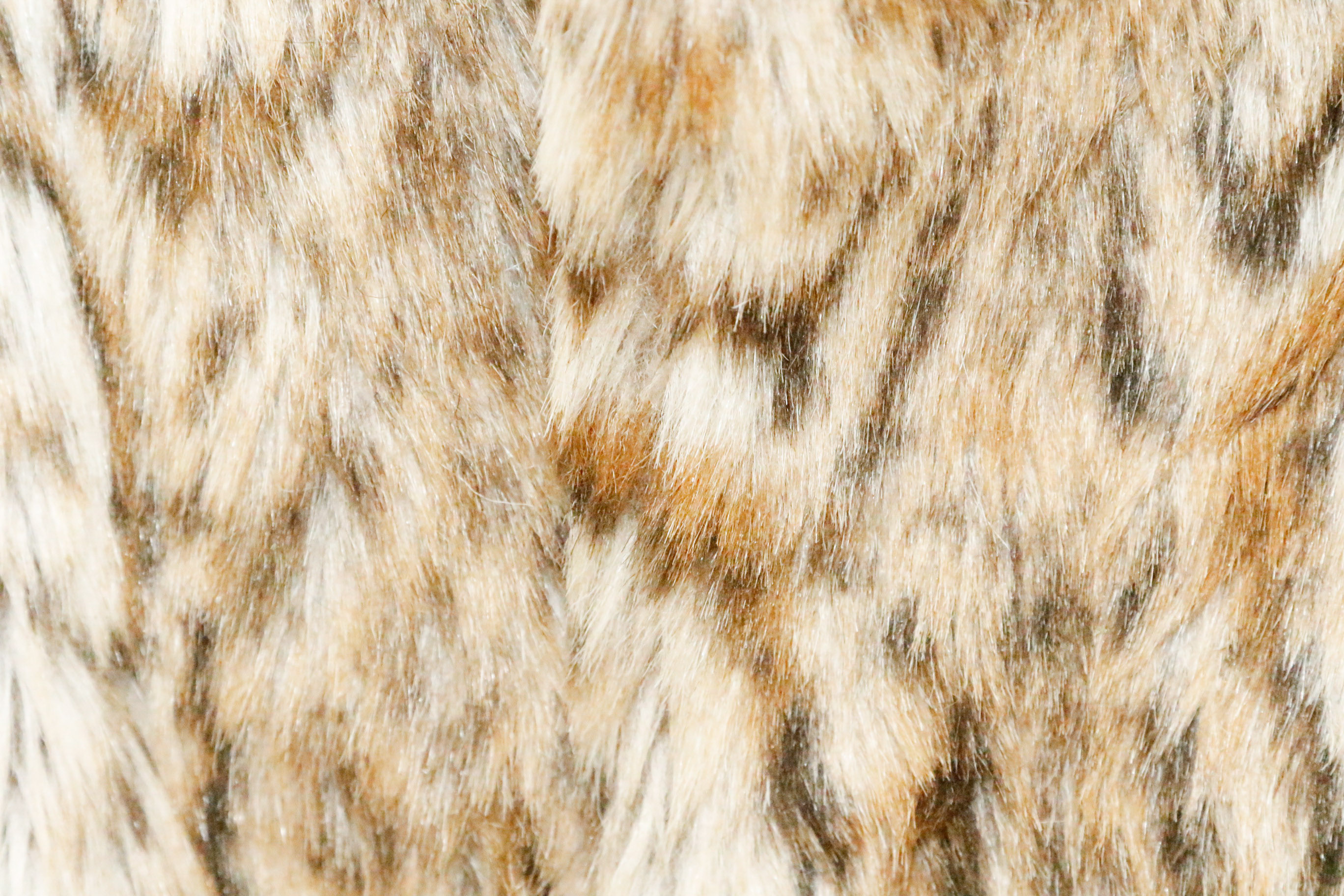 Two Fabulous White and Black Spotted Faux Fur Coats