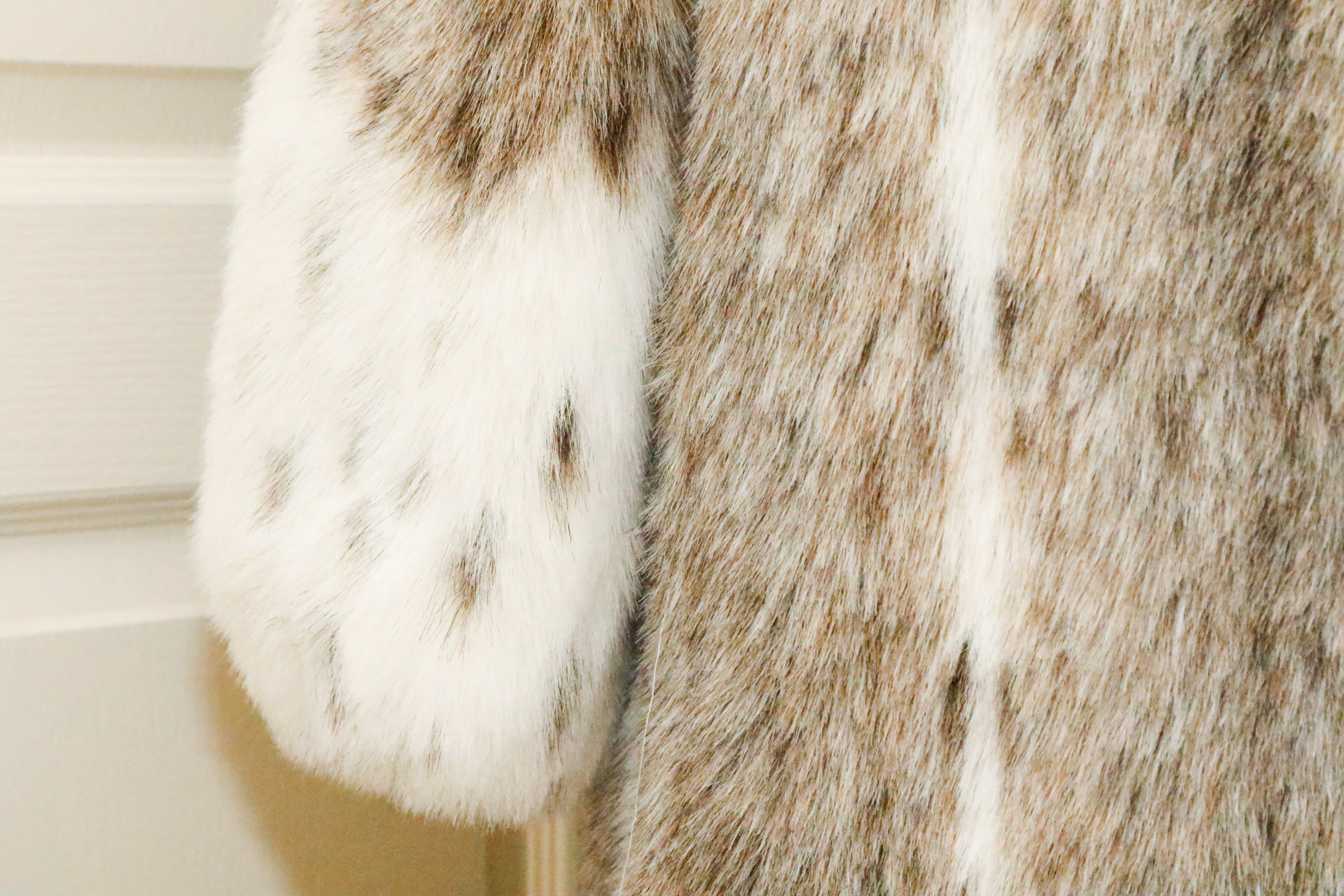 Two Fabulous White and Black Spotted Faux Fur Coats