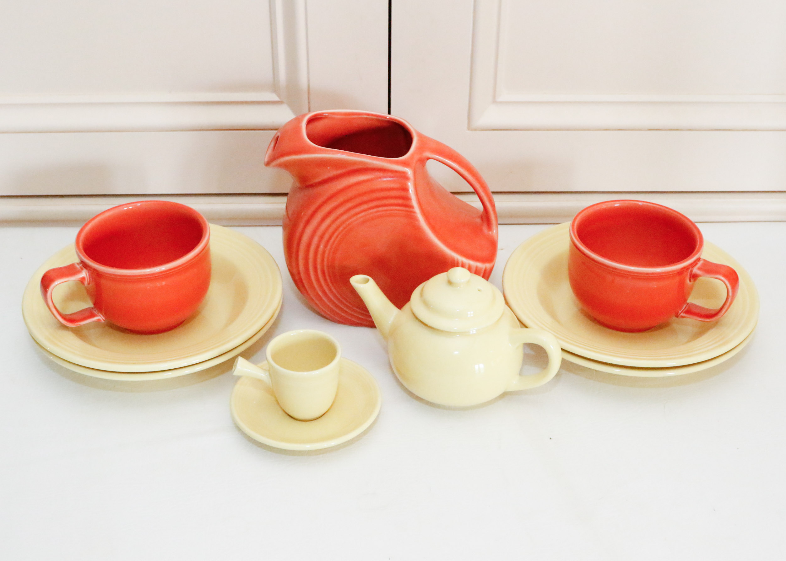 Fiestaware Collection in Persimmon and Post 86' Yellow