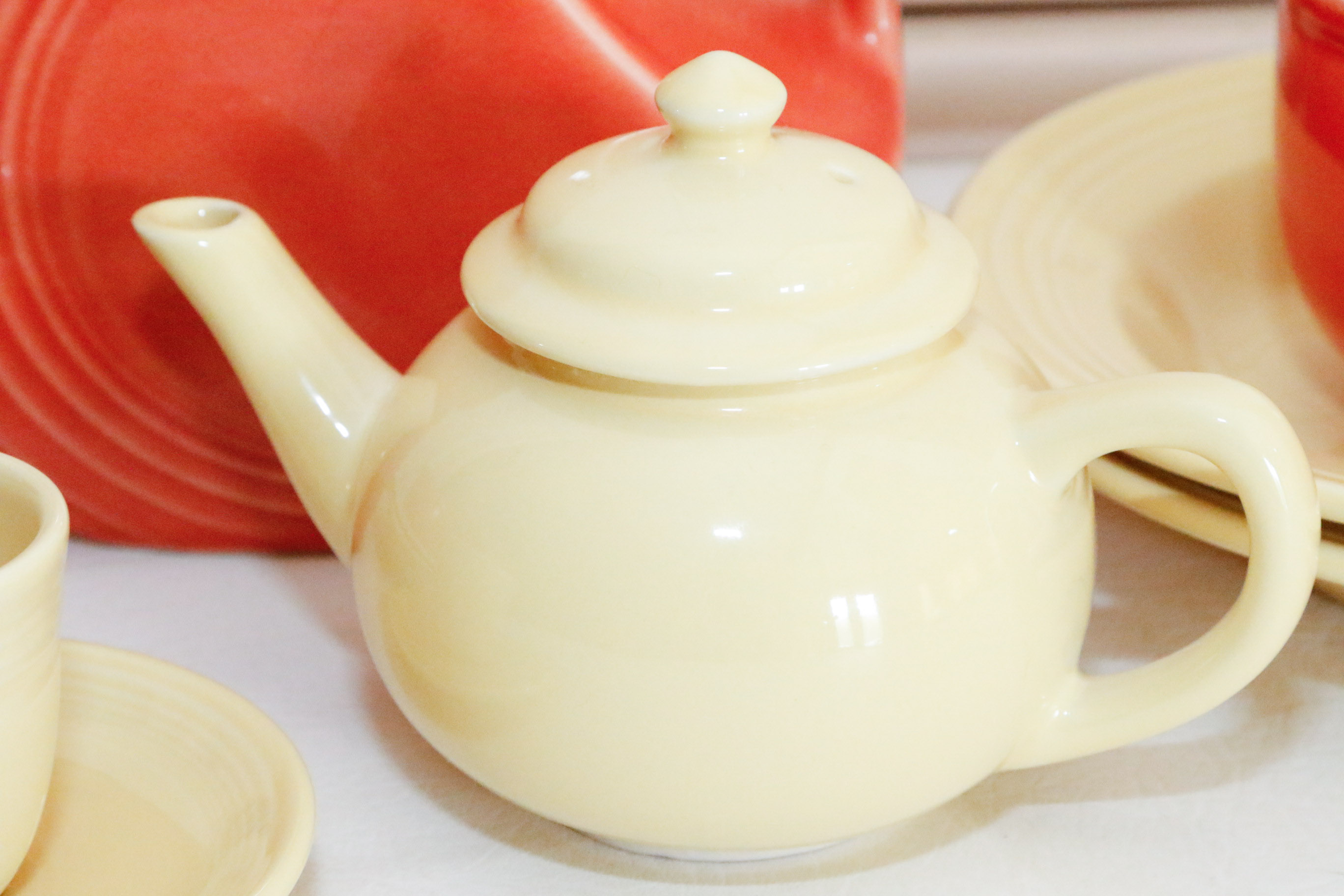 Fiestaware Collection in Persimmon and Post 86' Yellow