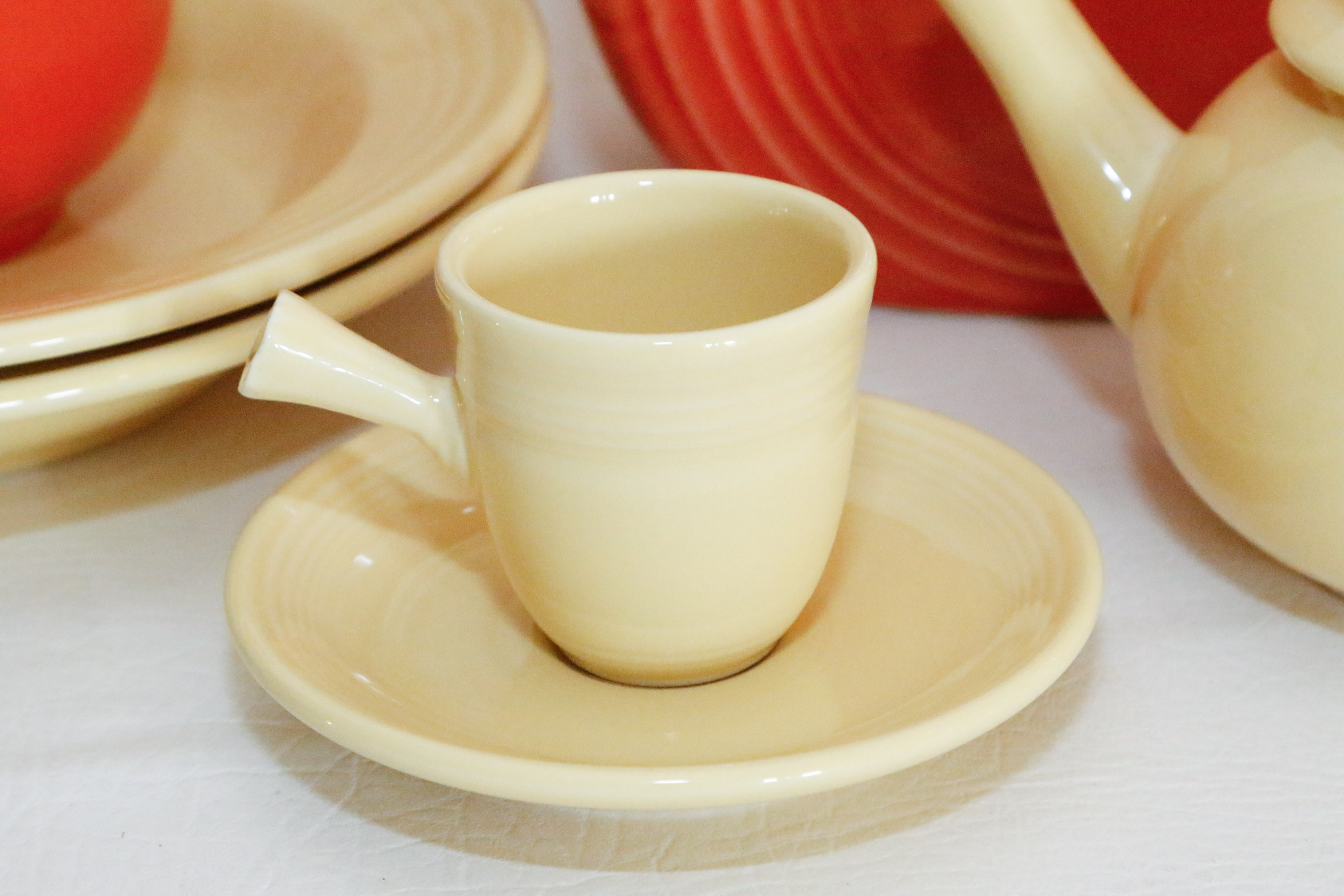 Fiestaware Collection in Persimmon and Post 86' Yellow