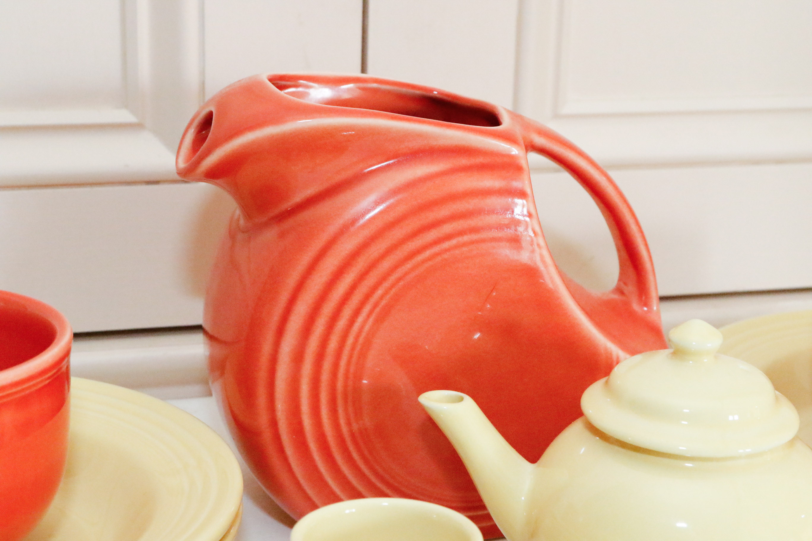 Fiestaware Collection in Persimmon and Post 86' Yellow