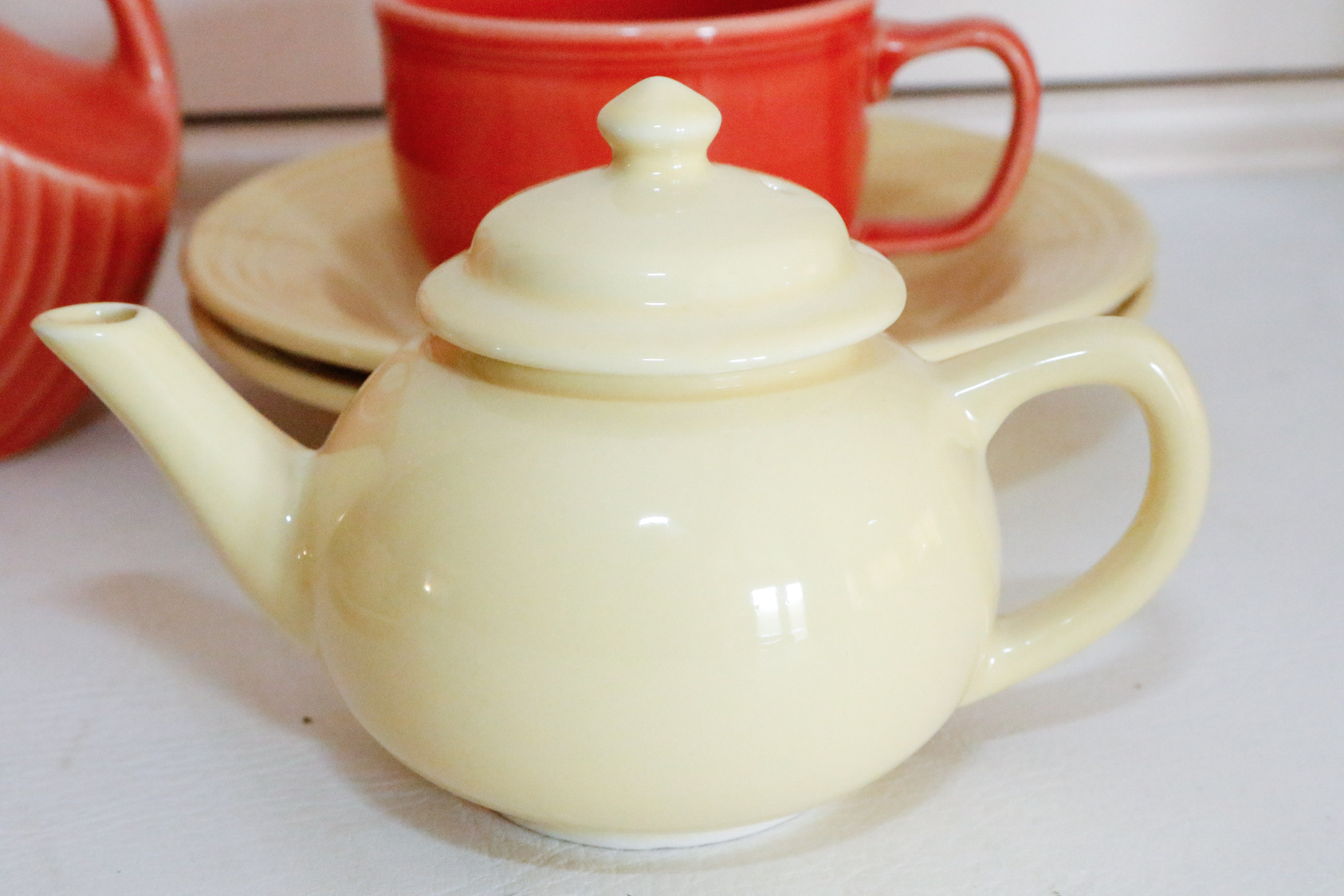 Fiestaware Collection in Persimmon and Post 86' Yellow