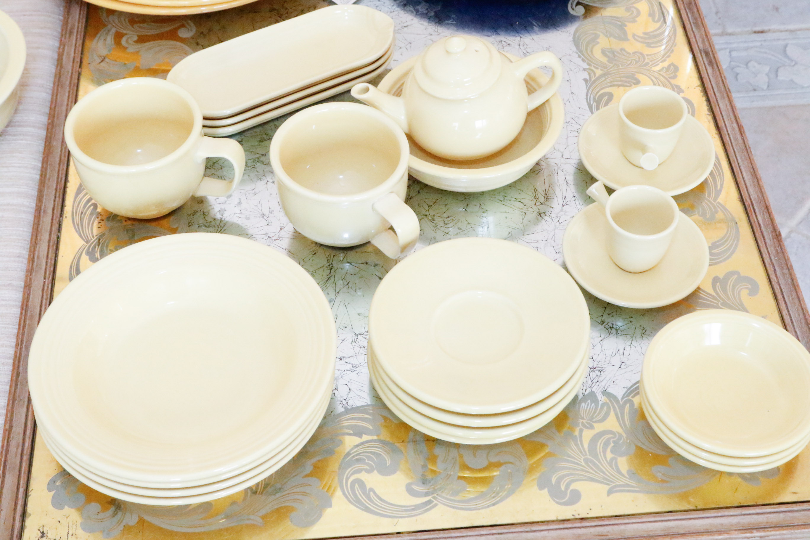 Fiestaware Collection in Persimmon and Post 86' Yellow