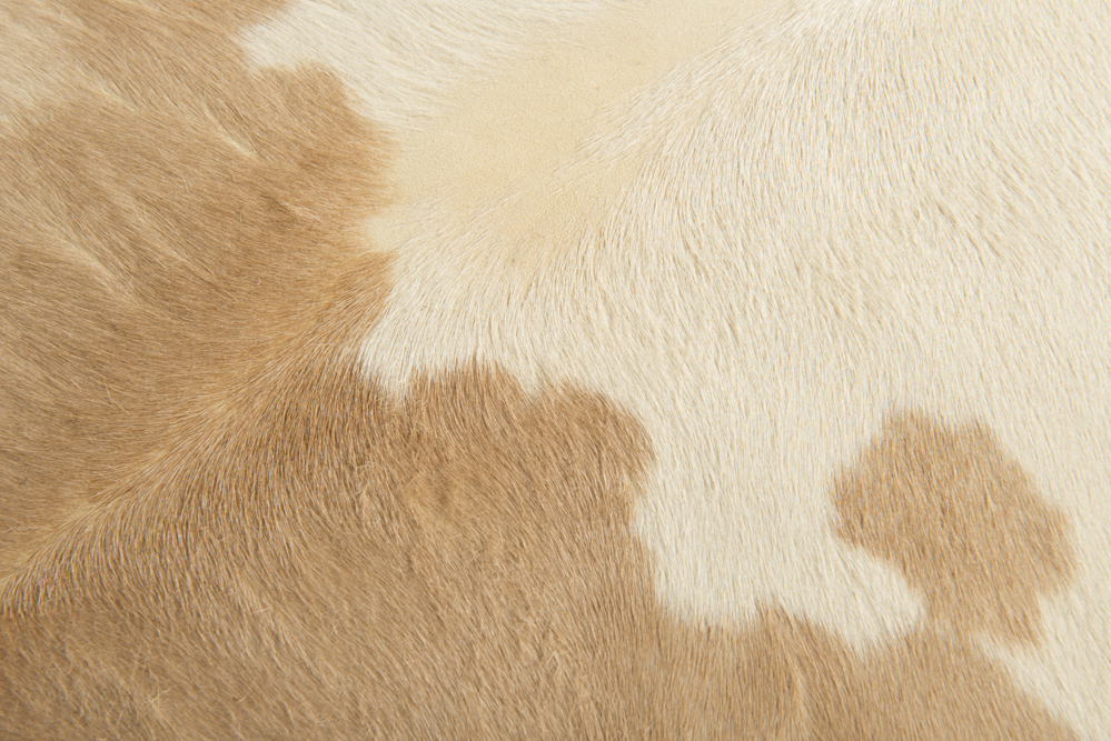 Round Cowhide Ottoman